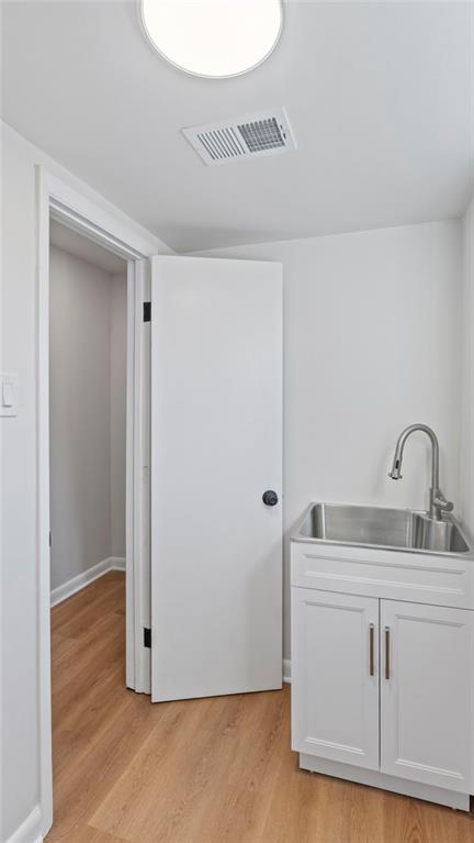 4088 Vale Court Decatur, GA 30035 - Photo 16 of 30 a view of cabinets and wooden floor