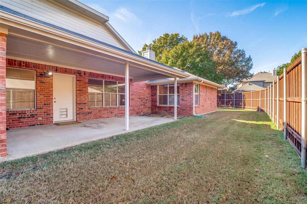 1202 Morrow Lane Allen, TX 75002 - Photo 31 of 35 Fenced backyard with a patio area