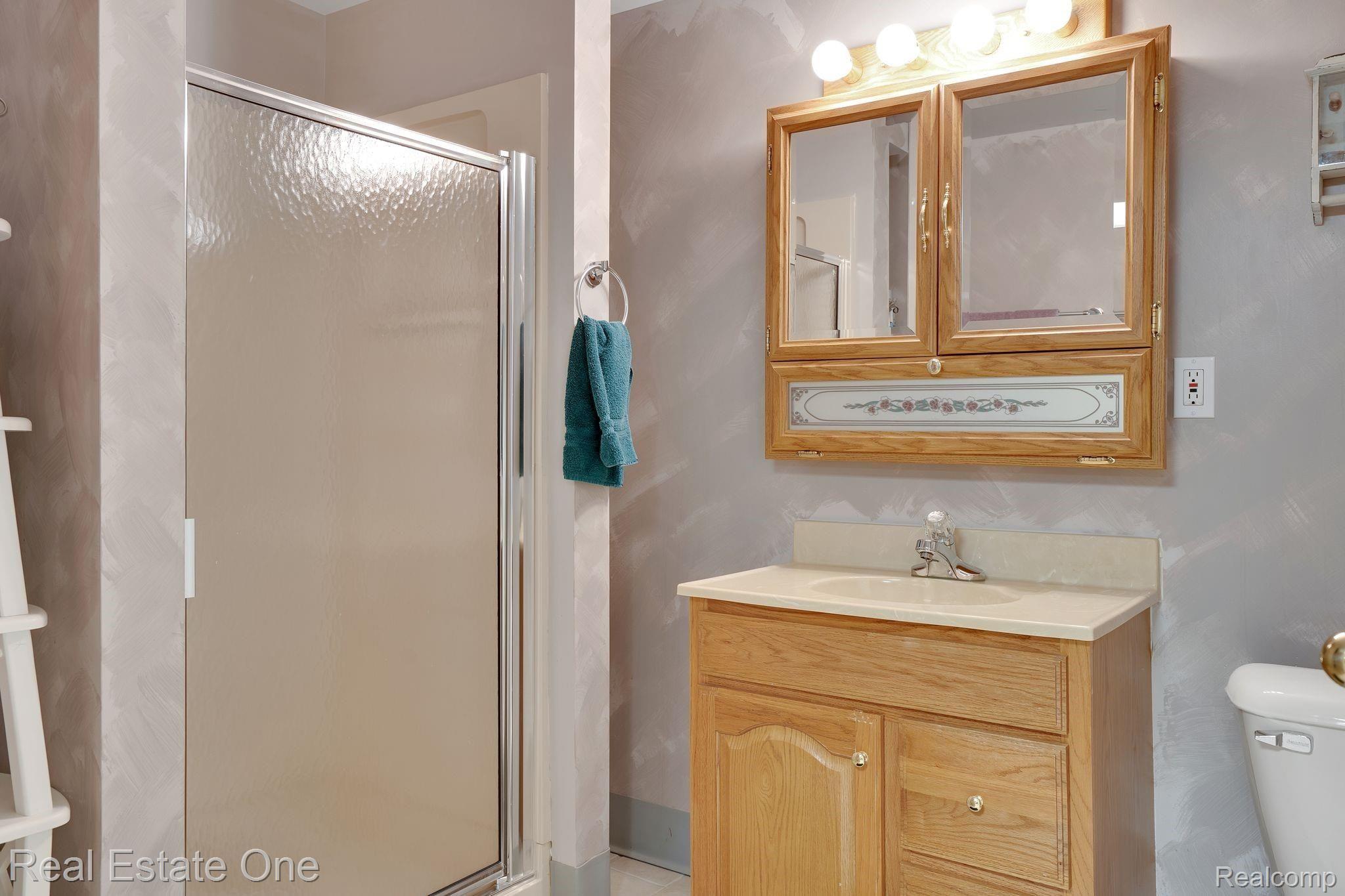 50285 Riverside Drive Macomb, MI 48044 - Photo 31 of 39 3RD FULL BATH IN LOWER LEVEL