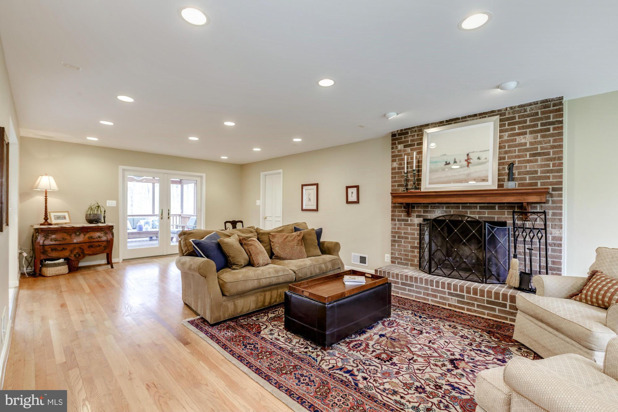 10515 Adel Road Oakton, VA 22124 - Photo 10 of 30 Family Room leading to Screened Porch