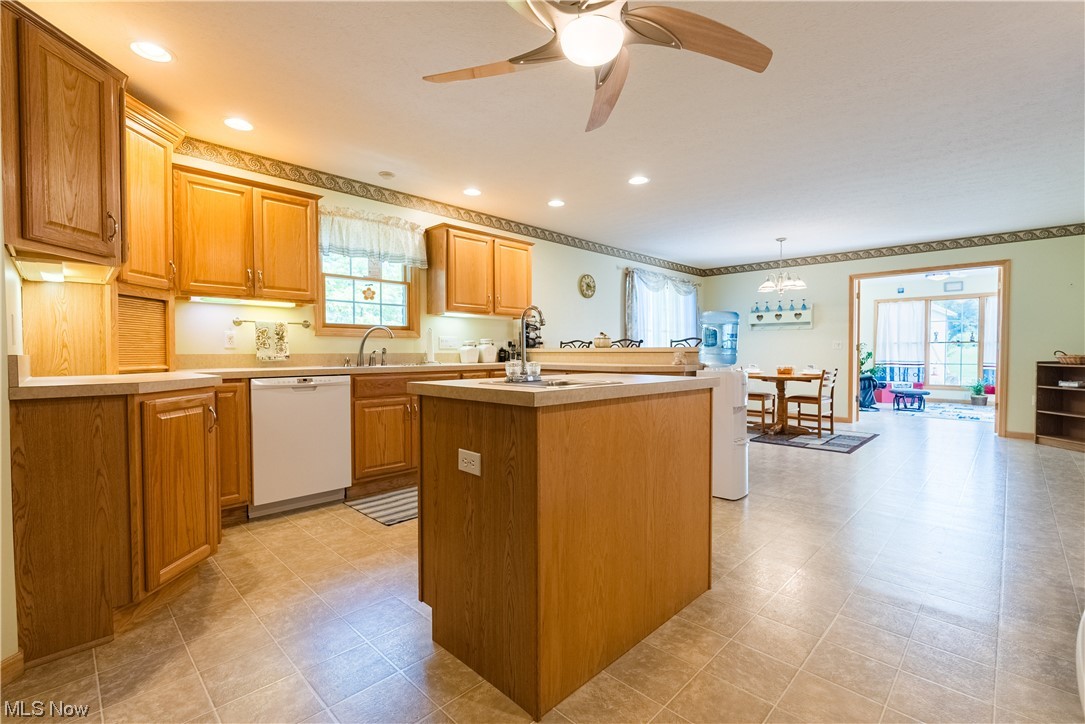 7055 Clark Road Atwater, OH 44201 - Photo 6 of 34 Open kitchen into dining area with plenty of cabinet and countertop space!