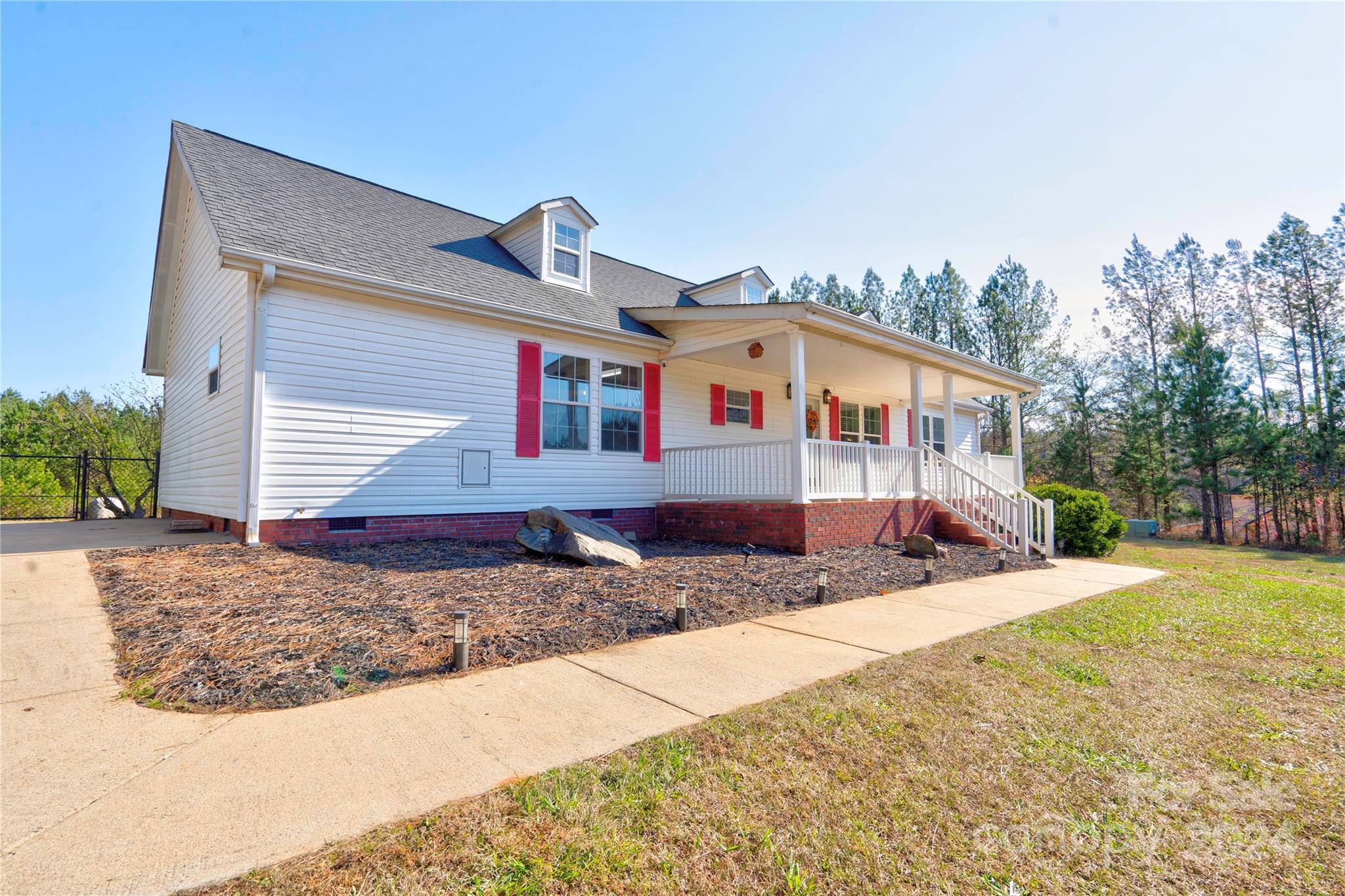 441 Dills Road Rutherfordton, NC 28139 - Photo 3 of 47 a front view of a house with a yard and garage
