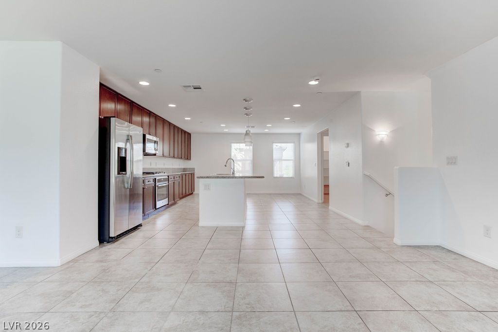 4650 Ranch House Road, Unit 47 North Las Vegas, NV 89031 - Photo 4 of 43 A well-appointed kitchen showcasing contemporary appliances and generous counter space for culinary endeavors.
