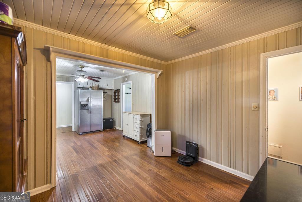 620 Pine Ridge Street Perry, GA 31069 - Photo 11 of 28 a view of a hallway with wooden floor