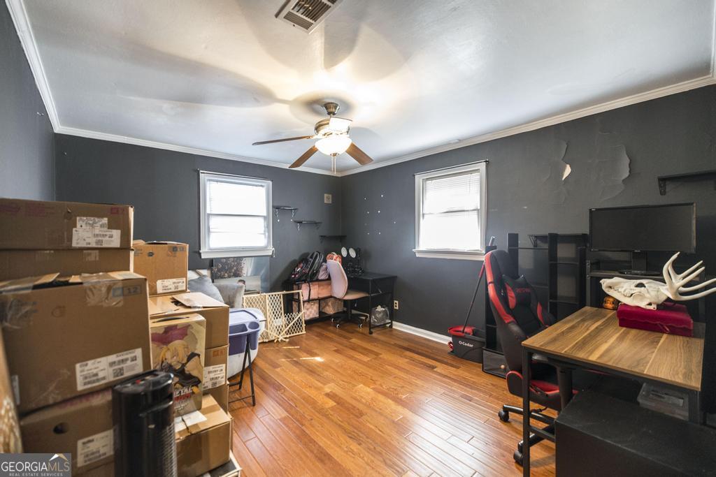 620 Pine Ridge Street Perry, GA 31069 - Photo 16 of 28 a room with gym equipment and a window