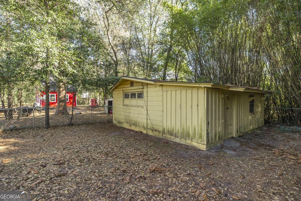 620 Pine Ridge Street Perry, GA 31069 - Photo 27 of 28 a view of a backyard of the house