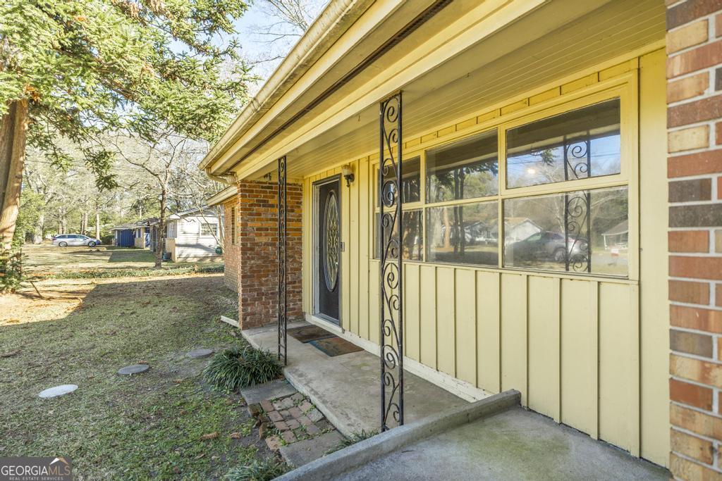 620 Pine Ridge Street Perry, GA 31069 - Photo 6 of 28 a view of a house with a backyard