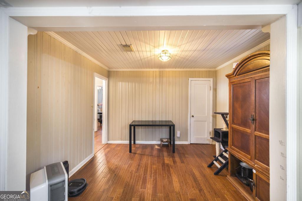 620 Pine Ridge Street Perry, GA 31069 - Photo 10 of 28 a view of room with furniture and wooden floor