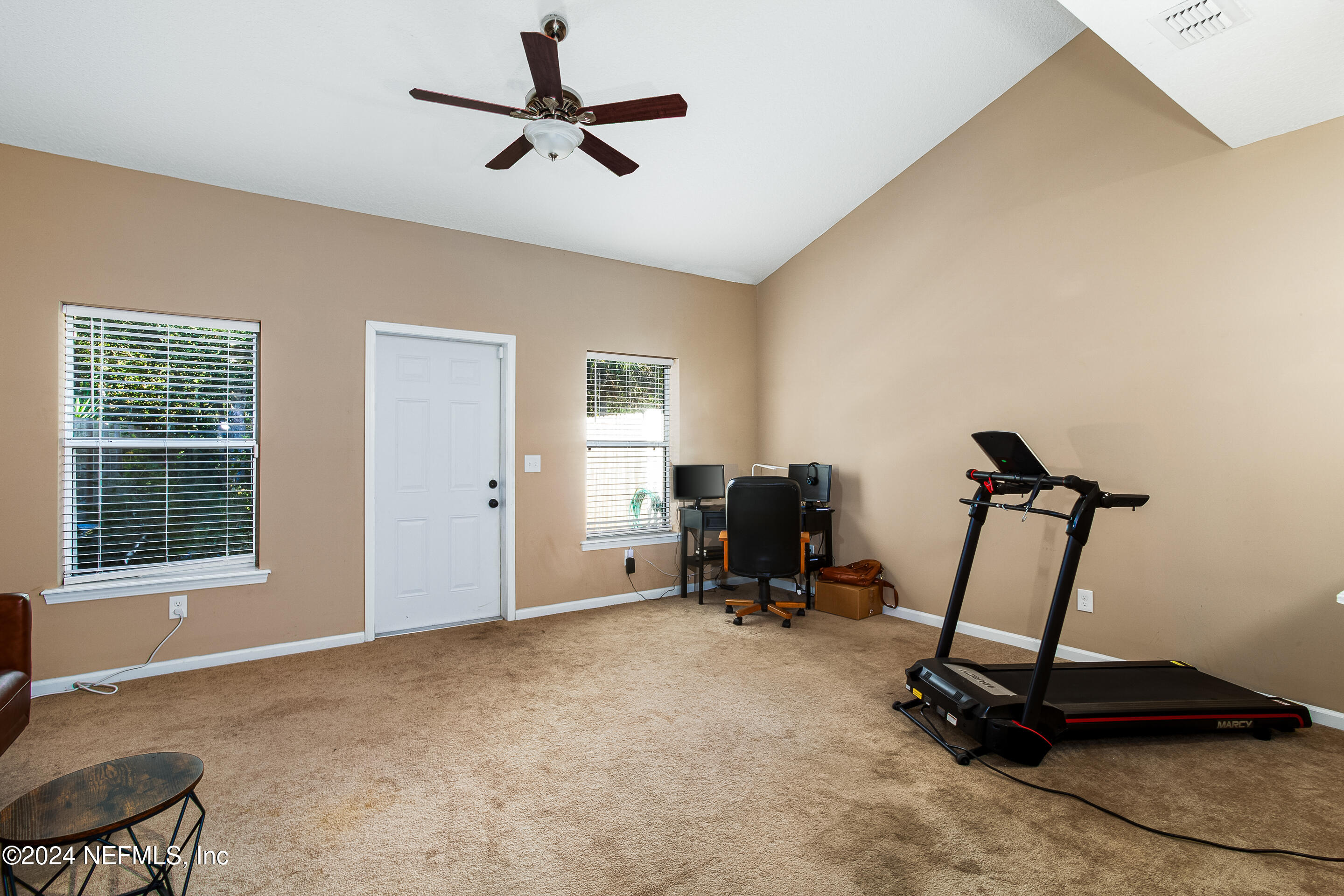87241 Lents Road Yulee, FL 32097 - Photo 11 of 19 a view of a room with gym equipment