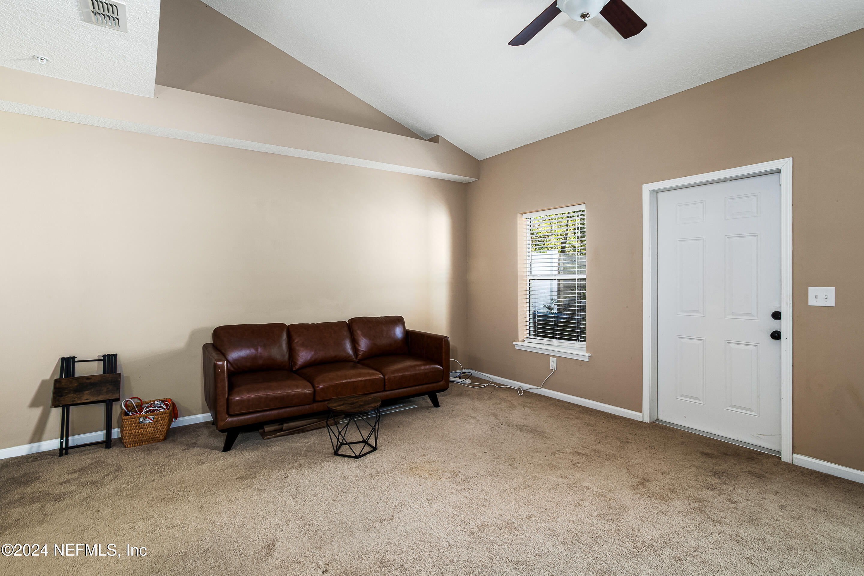 87241 Lents Road Yulee, FL 32097 - Photo 12 of 19 a living room with furniture and a window