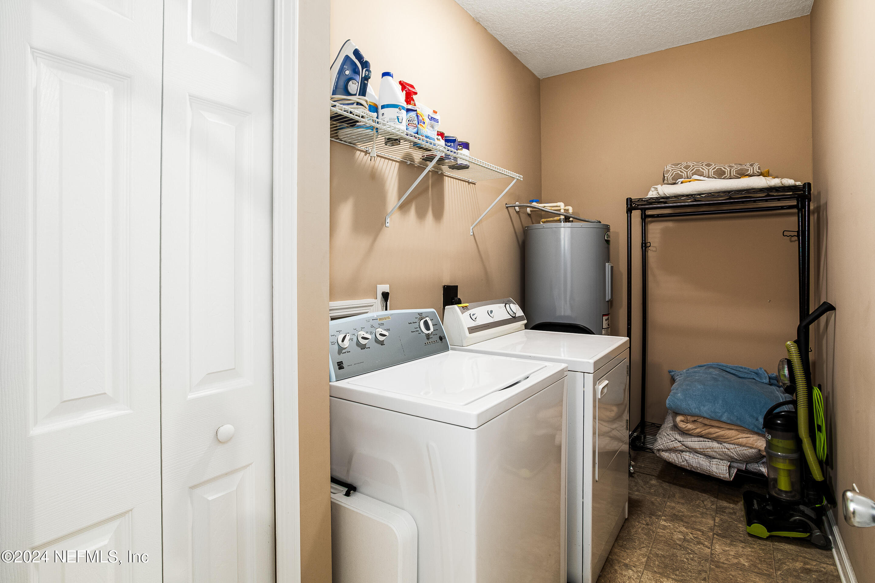 87241 Lents Road Yulee, FL 32097 - Photo 13 of 19 a utility room with dryer and washer