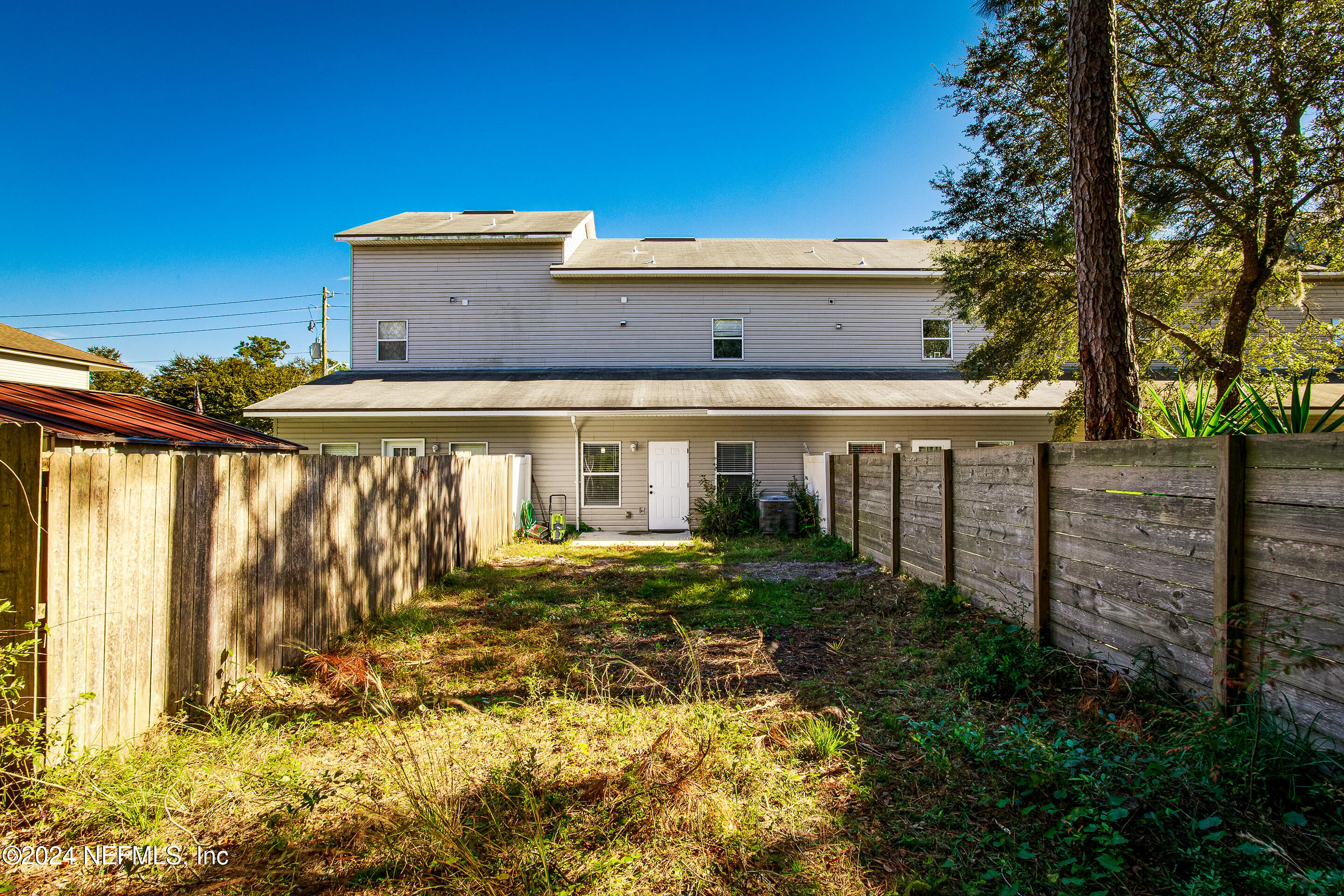 87241 Lents Road Yulee, FL 32097 - Photo 18 of 19 a front view of house with yard