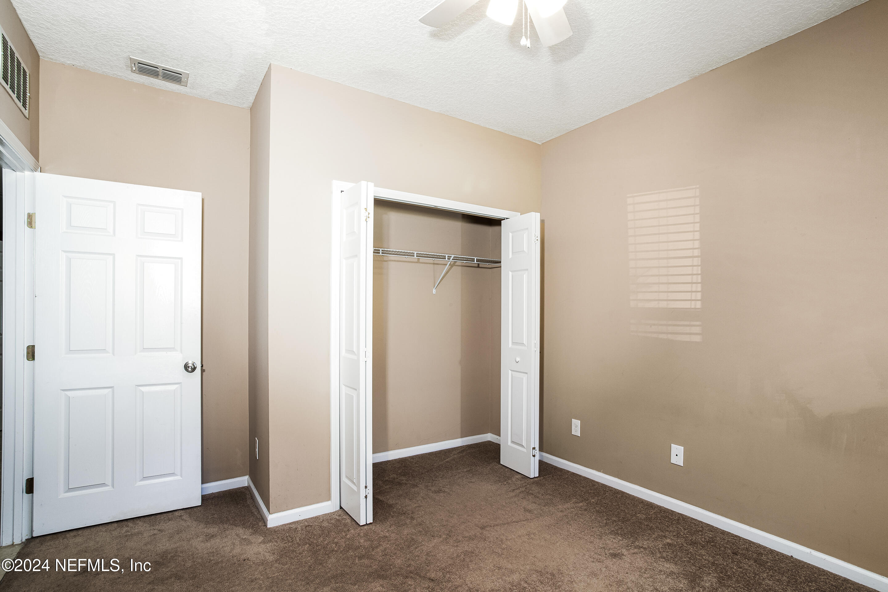 87241 Lents Road Yulee, FL 32097 - Photo 7 of 19 a view of an empty room with a window