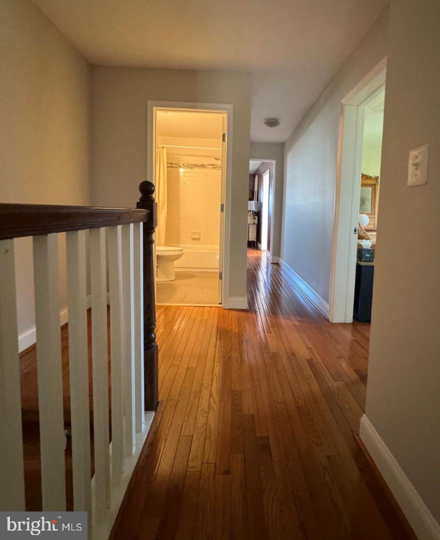 4818 Sheriff Road Northeast Washington, DC 20019 - Photo 21 of 36 a view of hallway with wooden floor