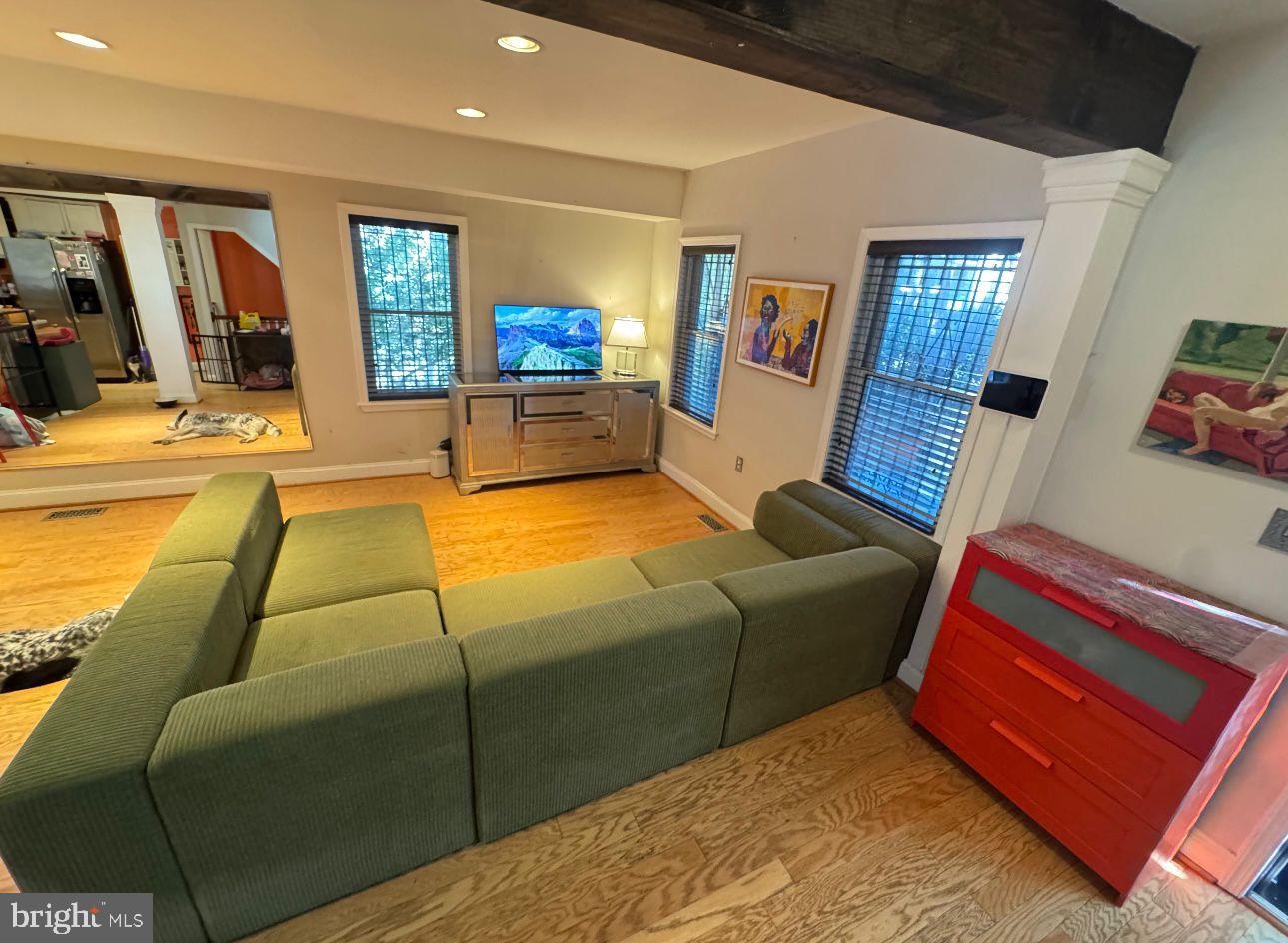 4818 Sheriff Road Northeast Washington, DC 20019 - Photo 7 of 36 a living room with furniture rug and wooden floor
