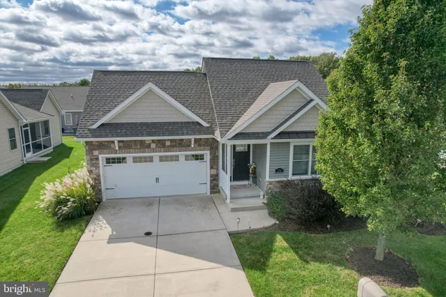 a house view with a garden space