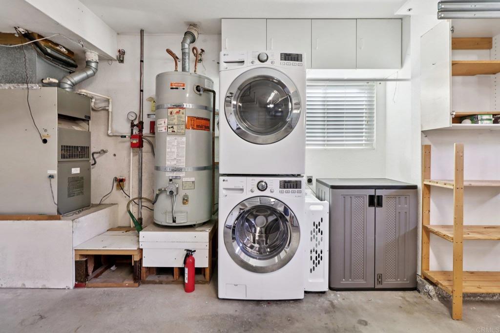 9863 Avenida Colino Spring Valley, CA 91977 - Photo 30 of 54 a utility room with dryer and washer