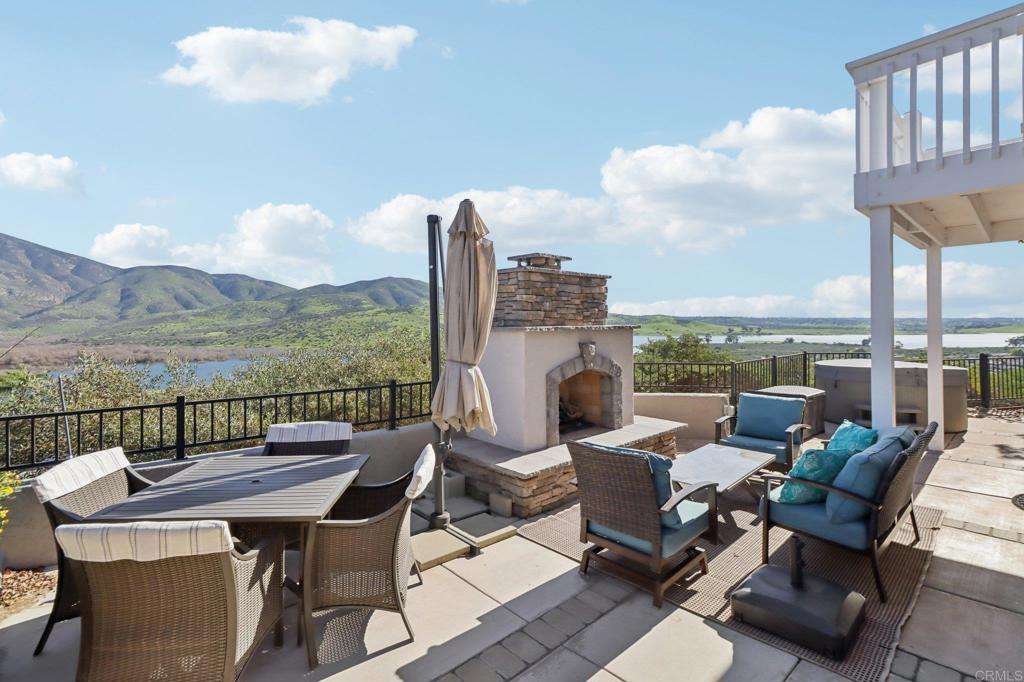 9863 Avenida Colino Spring Valley, CA 91977 - Photo 34 of 54 a view of a terrace with furniture and a table