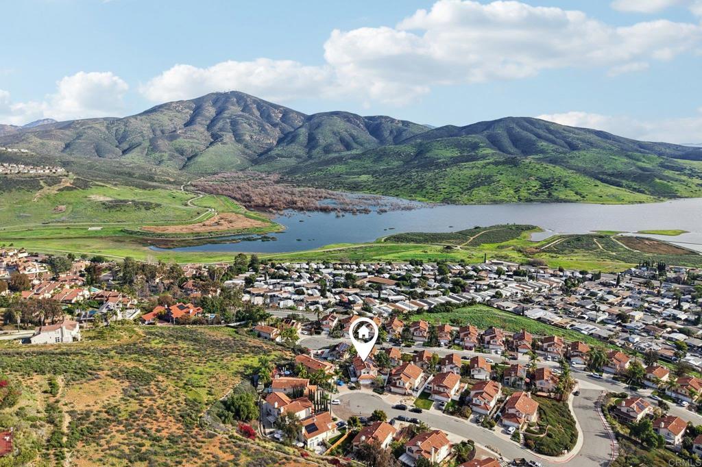 9863 Avenida Colino Spring Valley, CA 91977 - Photo 4 of 54 a view of a city with mountains in the background