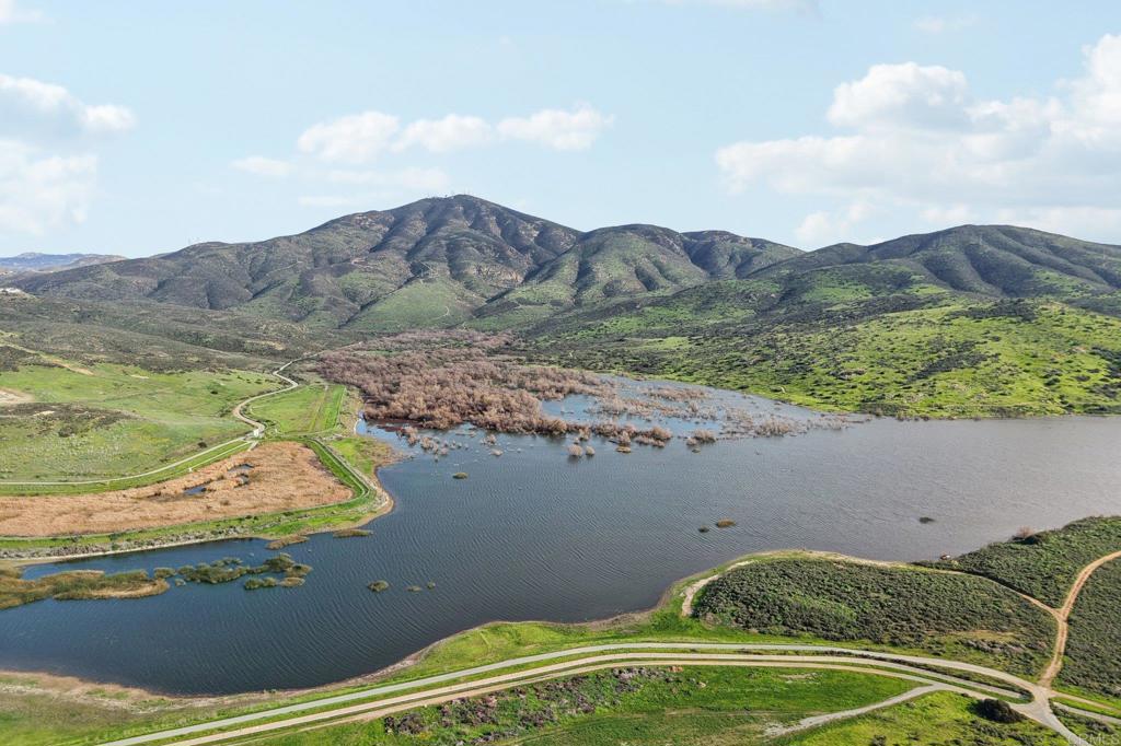 9863 Avenida Colino Spring Valley, CA 91977 - Photo 51 of 54 a view of a swimming pool with a yard