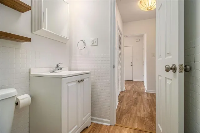 a bathroom with a sink and mirror