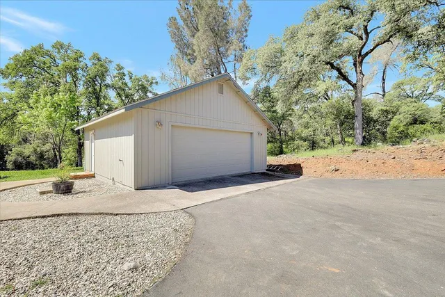 a view of balcony with wooden floor and fence