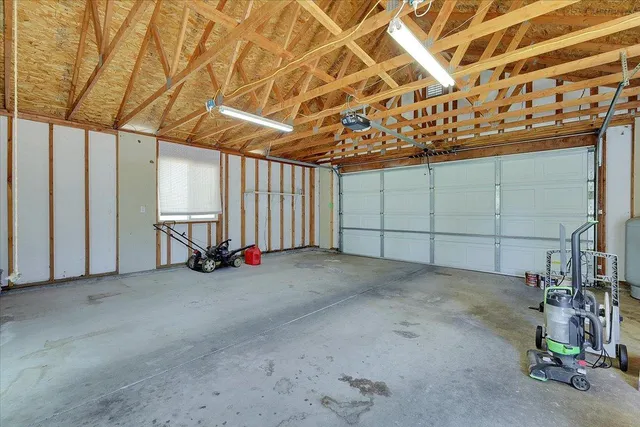 a view of storage and utility room with stairs