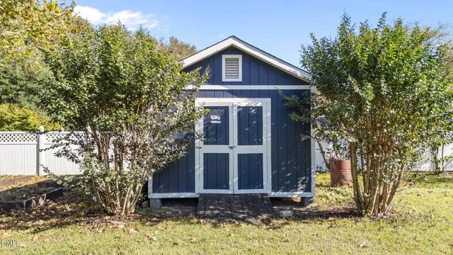 a view of a deck with a yard