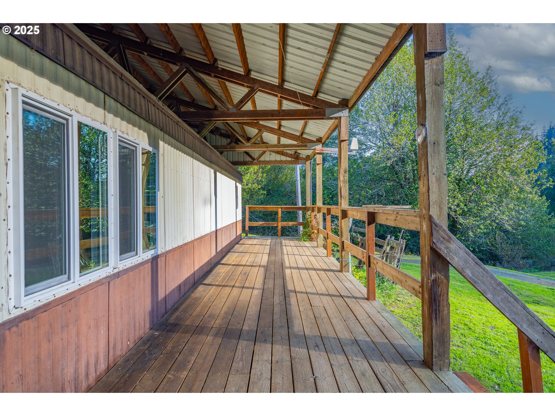 15779 Highway 42 Myrtle Point, OR 97458 - Photo 21 of 33 a view of porch with wooden floor