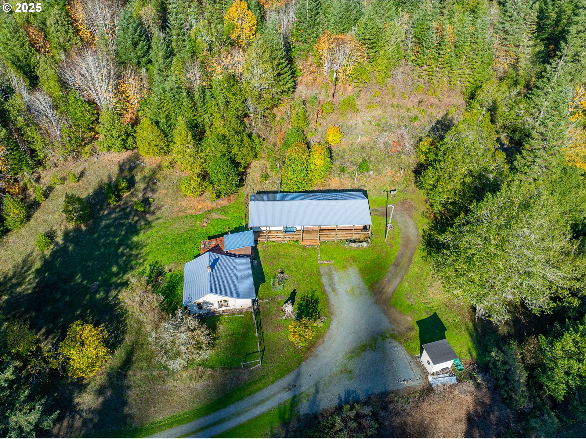 15779 Highway 42 Myrtle Point, OR 97458 - Photo 33 of 33 an aerial view of a house with outdoor space