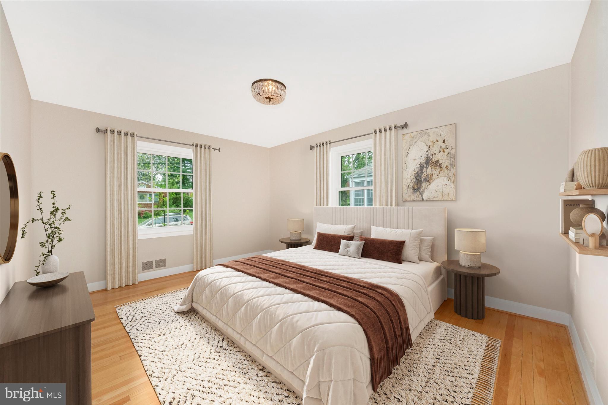 9905 Portland Road Silver Spring, MD 20901 - Photo 16 of 52 a bedroom with a large bed and a window