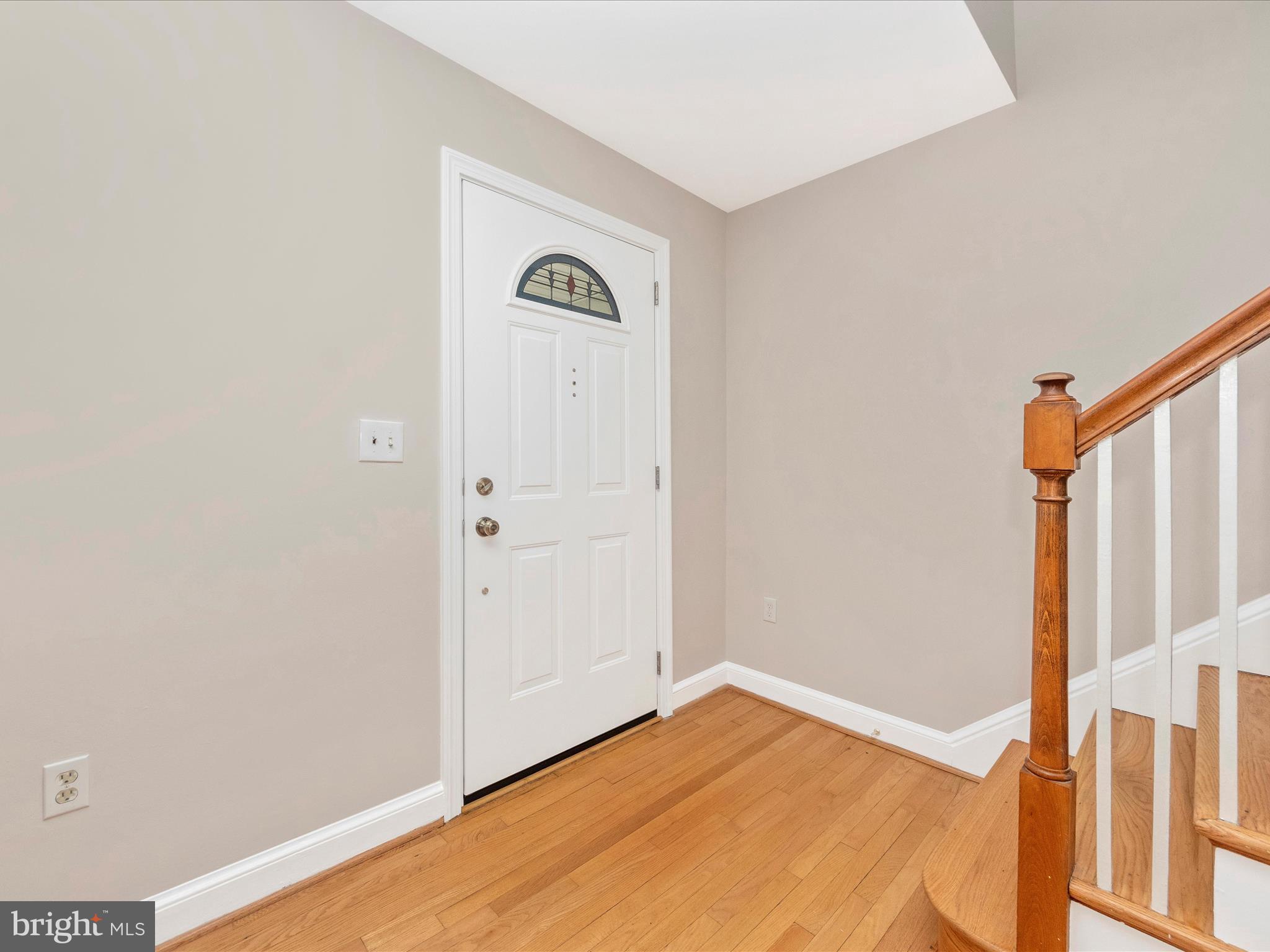 9905 Portland Road Silver Spring, MD 20901 - Photo 2 of 52 a view of empty room with wooden floor