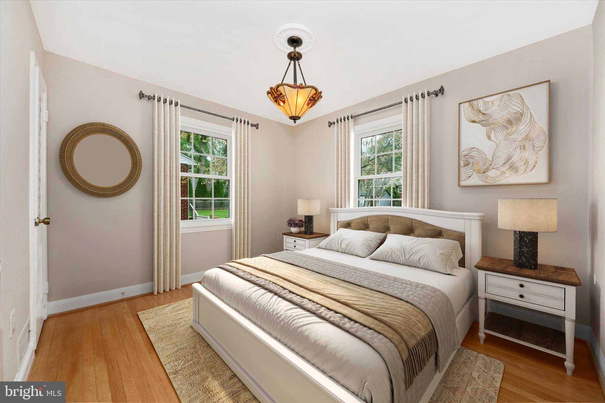 9905 Portland Road Silver Spring, MD 20901 - Photo 23 of 52 a bedroom with a bed and a window