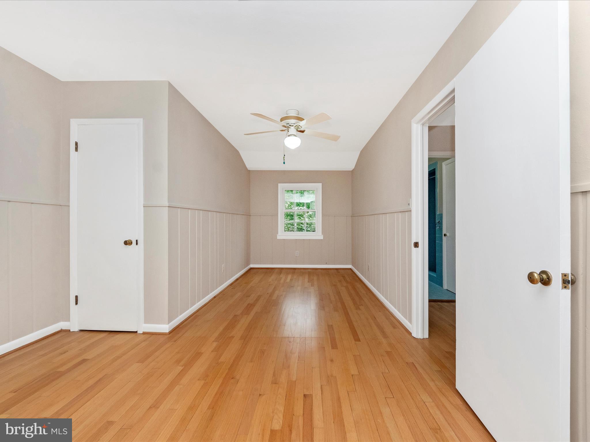 9905 Portland Road Silver Spring, MD 20901 - Photo 29 of 52 wooden floor in an empty room with a window