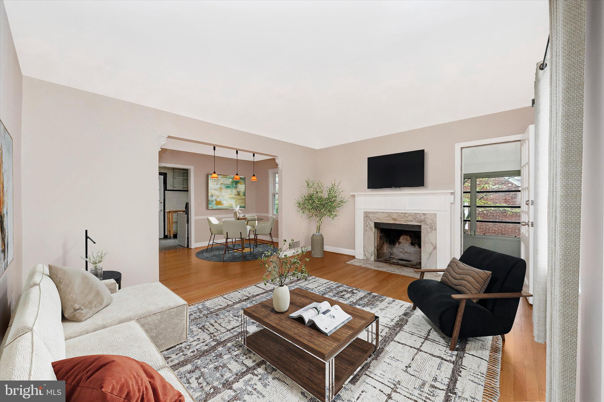 9905 Portland Road Silver Spring, MD 20901 - Photo 3 of 52 a living room with furniture and a fireplace