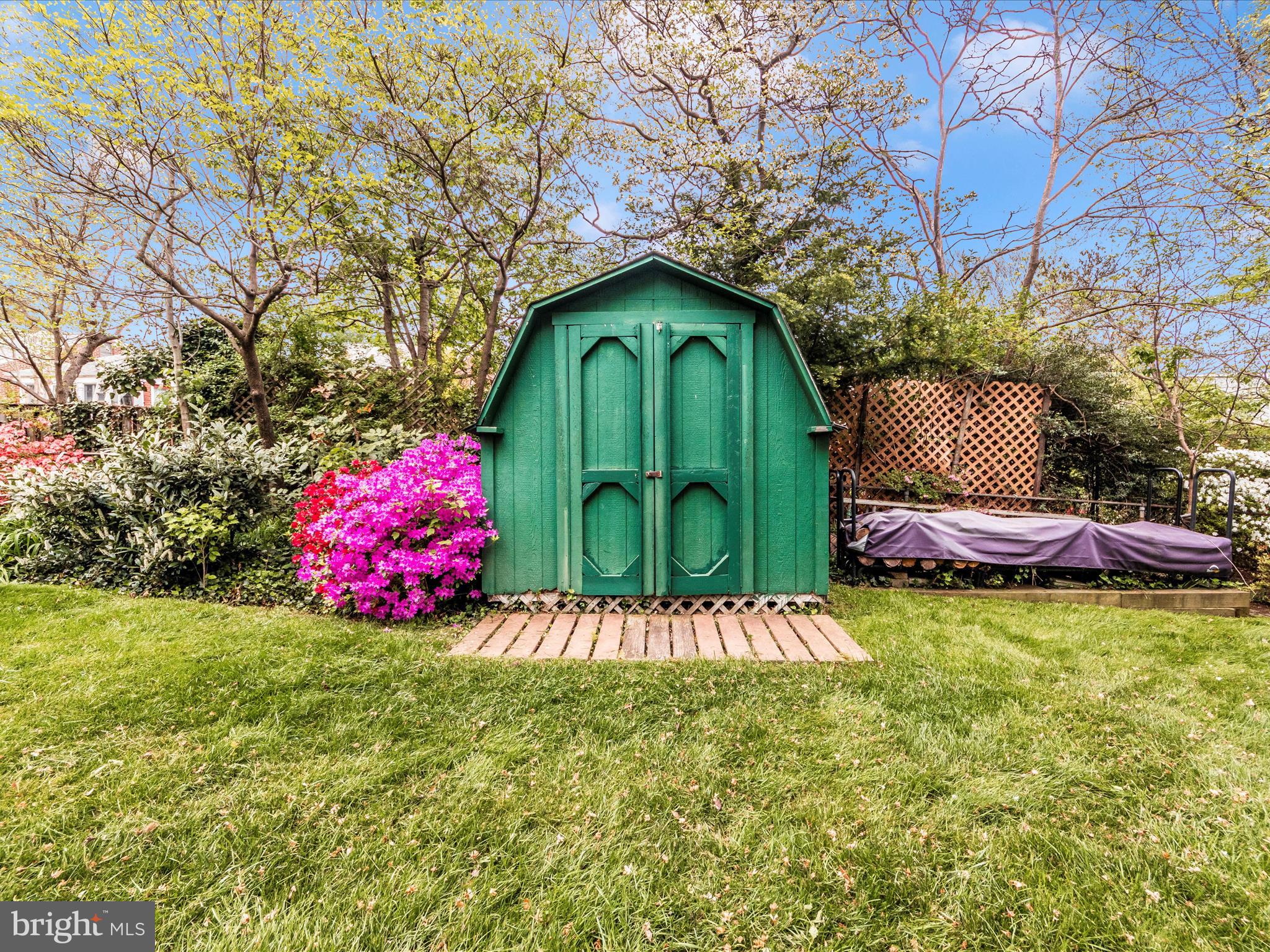 9905 Portland Road Silver Spring, MD 20901 - Photo 41 of 52 a view of a wooden house with a yard