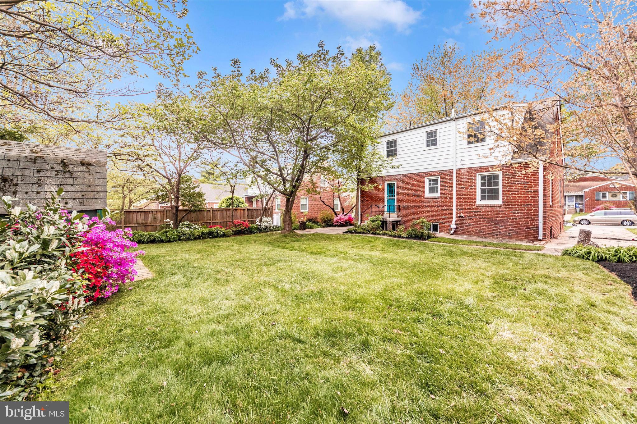 9905 Portland Road Silver Spring, MD 20901 - Photo 48 of 52 a view of a yard with a house in the background
