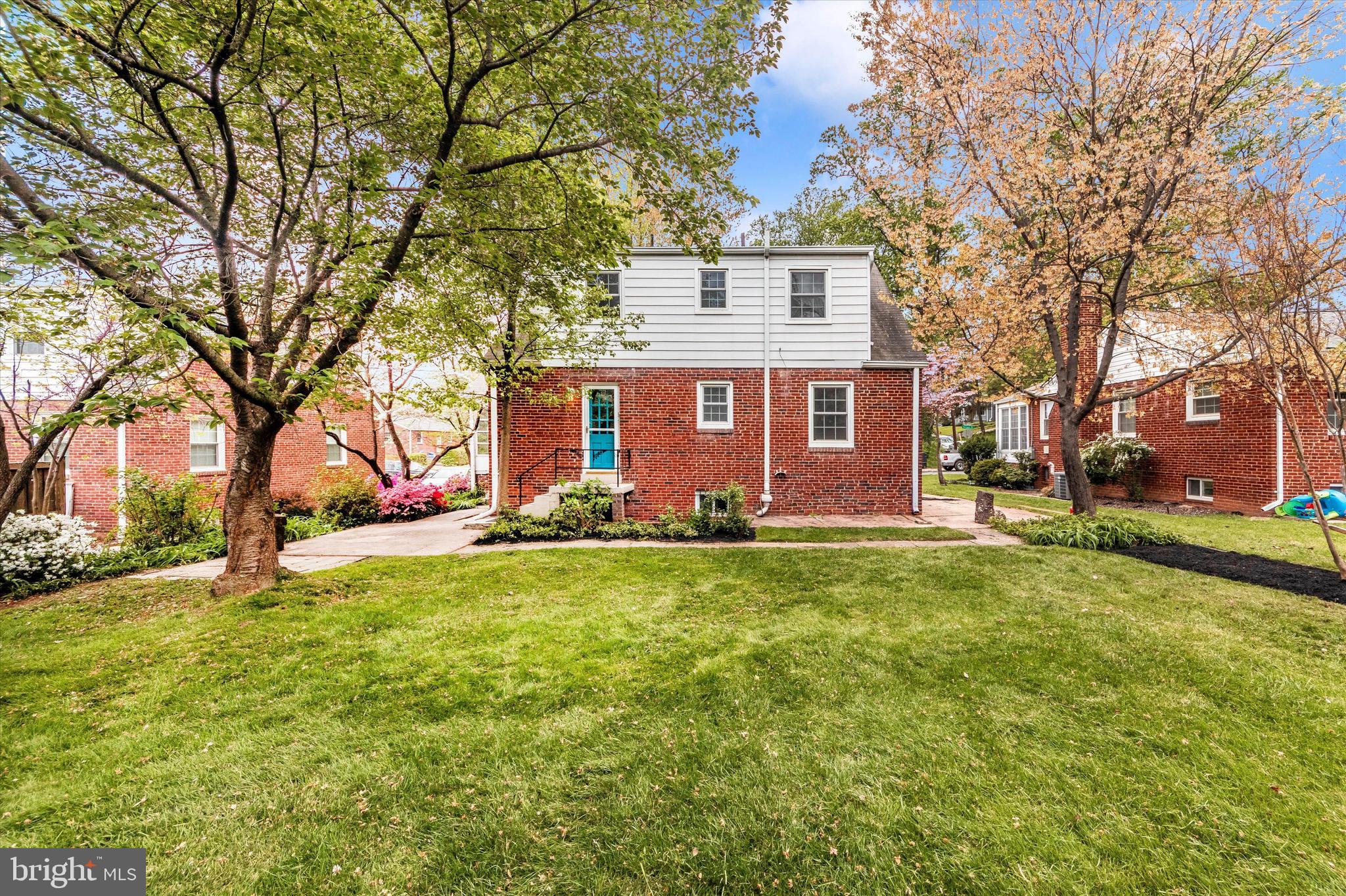 9905 Portland Road Silver Spring, MD 20901 - Photo 49 of 52 a view of a house with a backyard