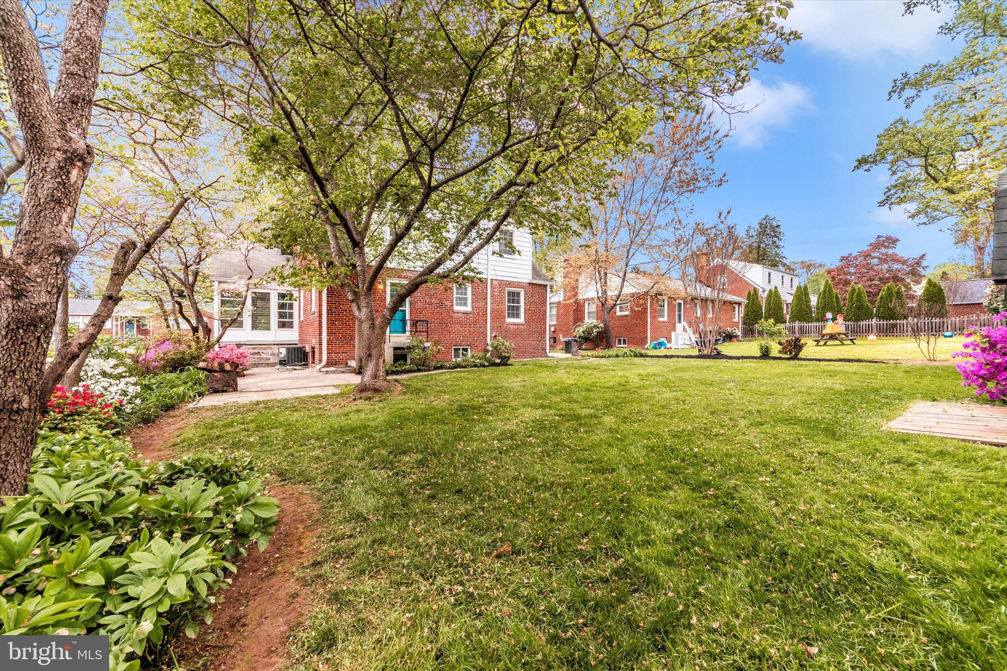 9905 Portland Road Silver Spring, MD 20901 - Photo 50 of 52 a view of a house with a yard