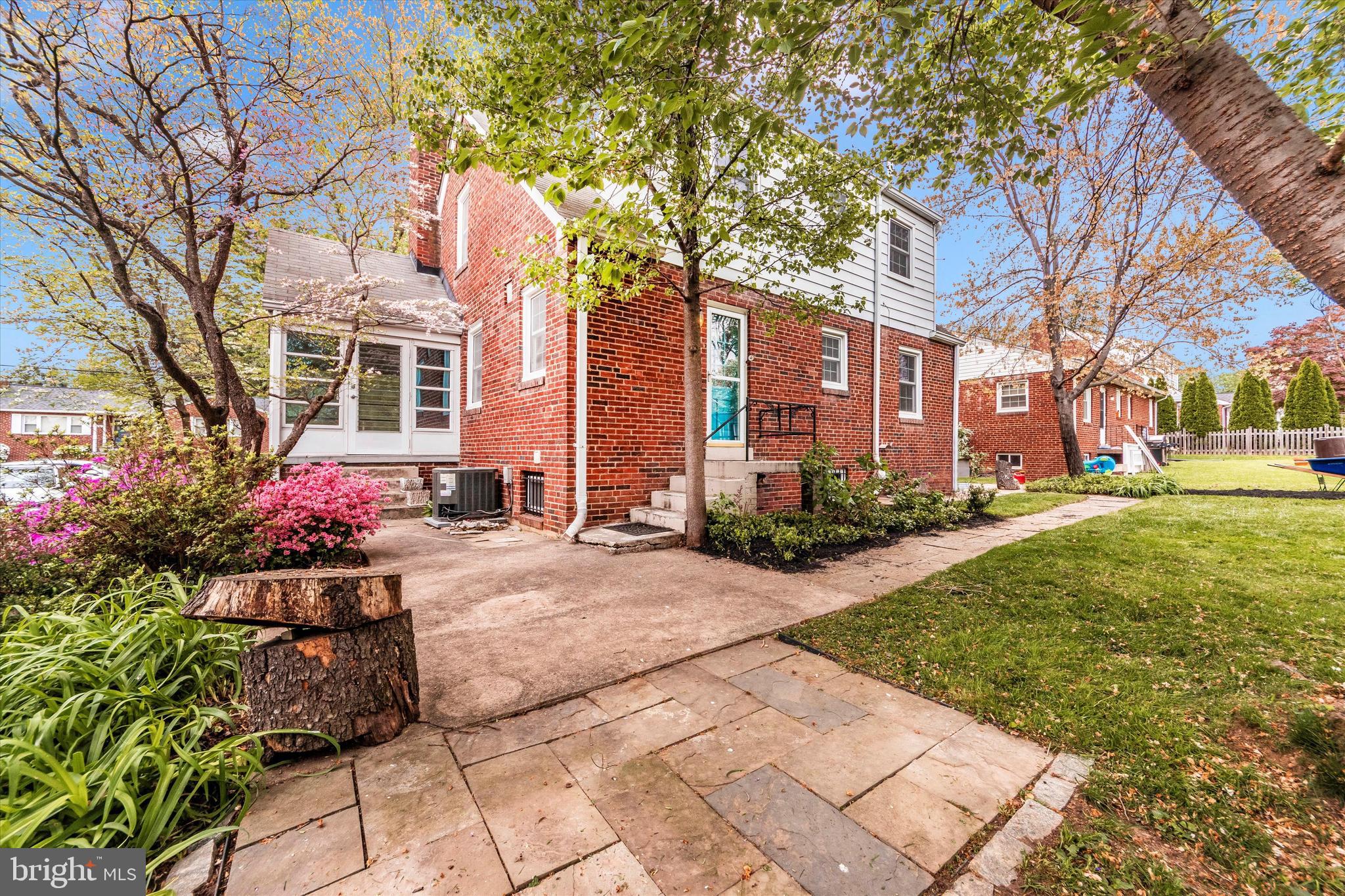 9905 Portland Road Silver Spring, MD 20901 - Photo 52 of 52 a front view of a building with garden