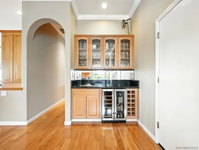 a view of a house with wooden floor and a window