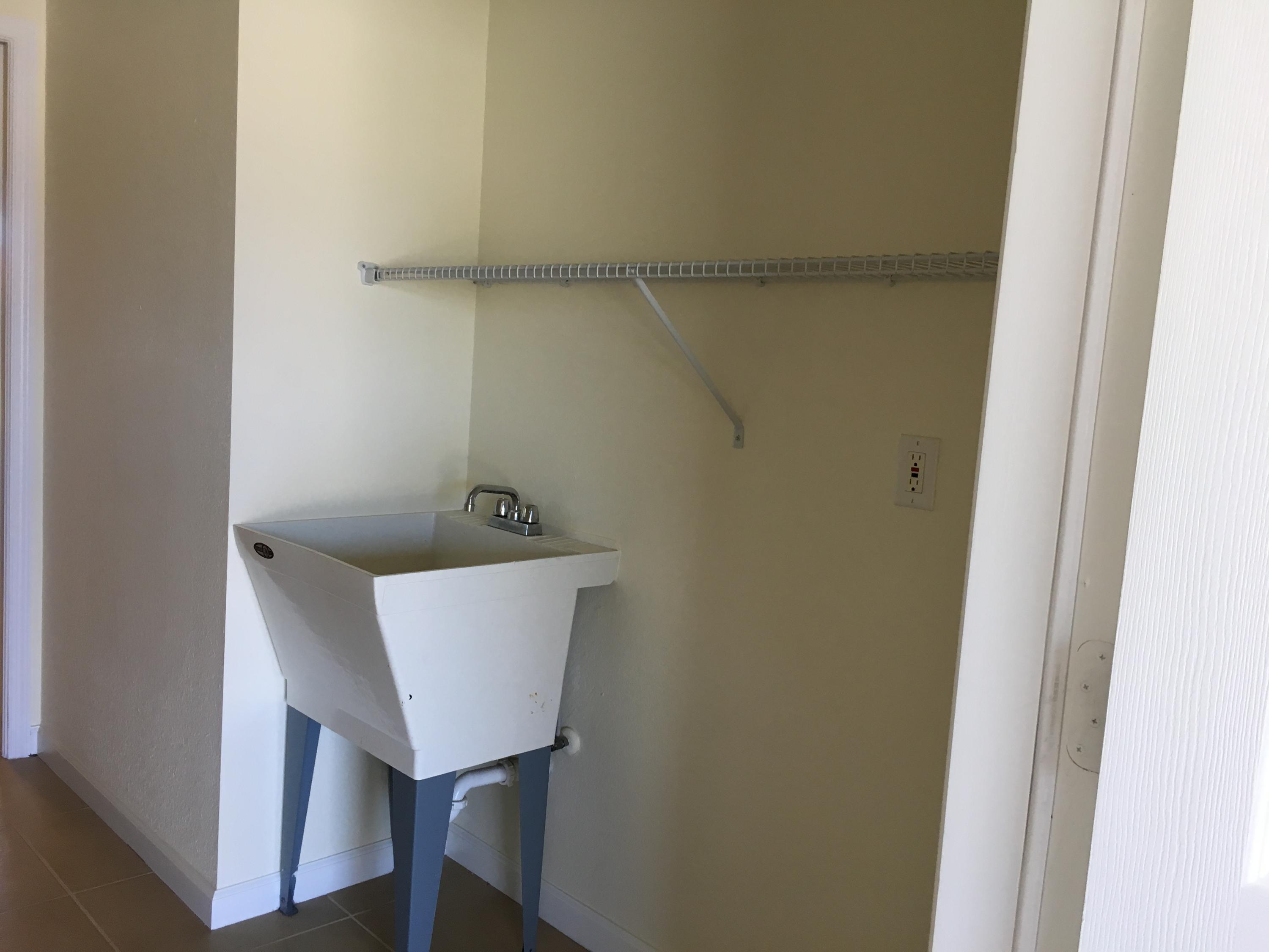 4220 Southwest Allsworth Street Port St. Lucie, FL 34953 - Photo 22 of 36 LAUNDRY ROOM