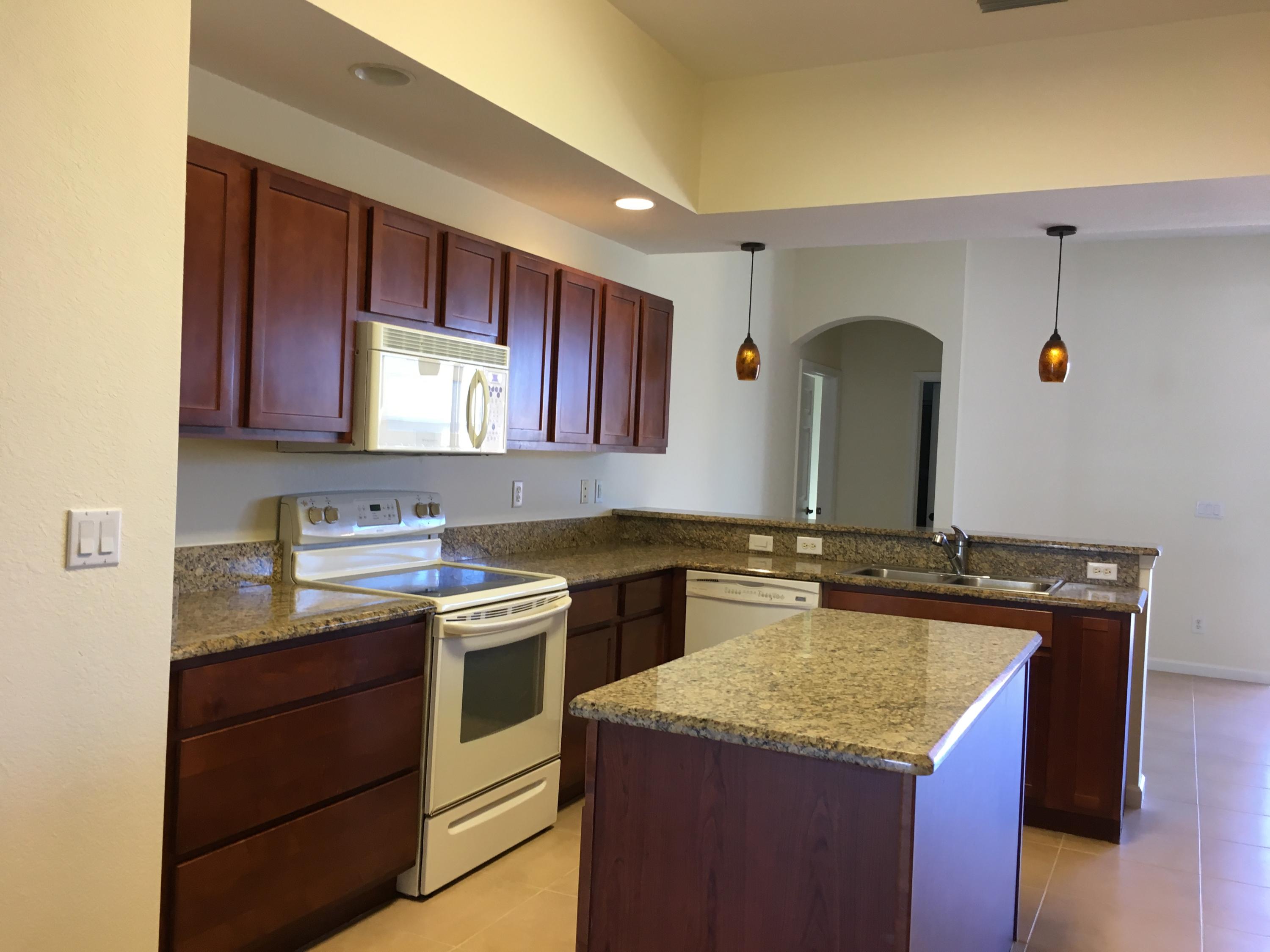 4220 Southwest Allsworth Street Port St. Lucie, FL 34953 - Photo 34 of 36 KITCHEN