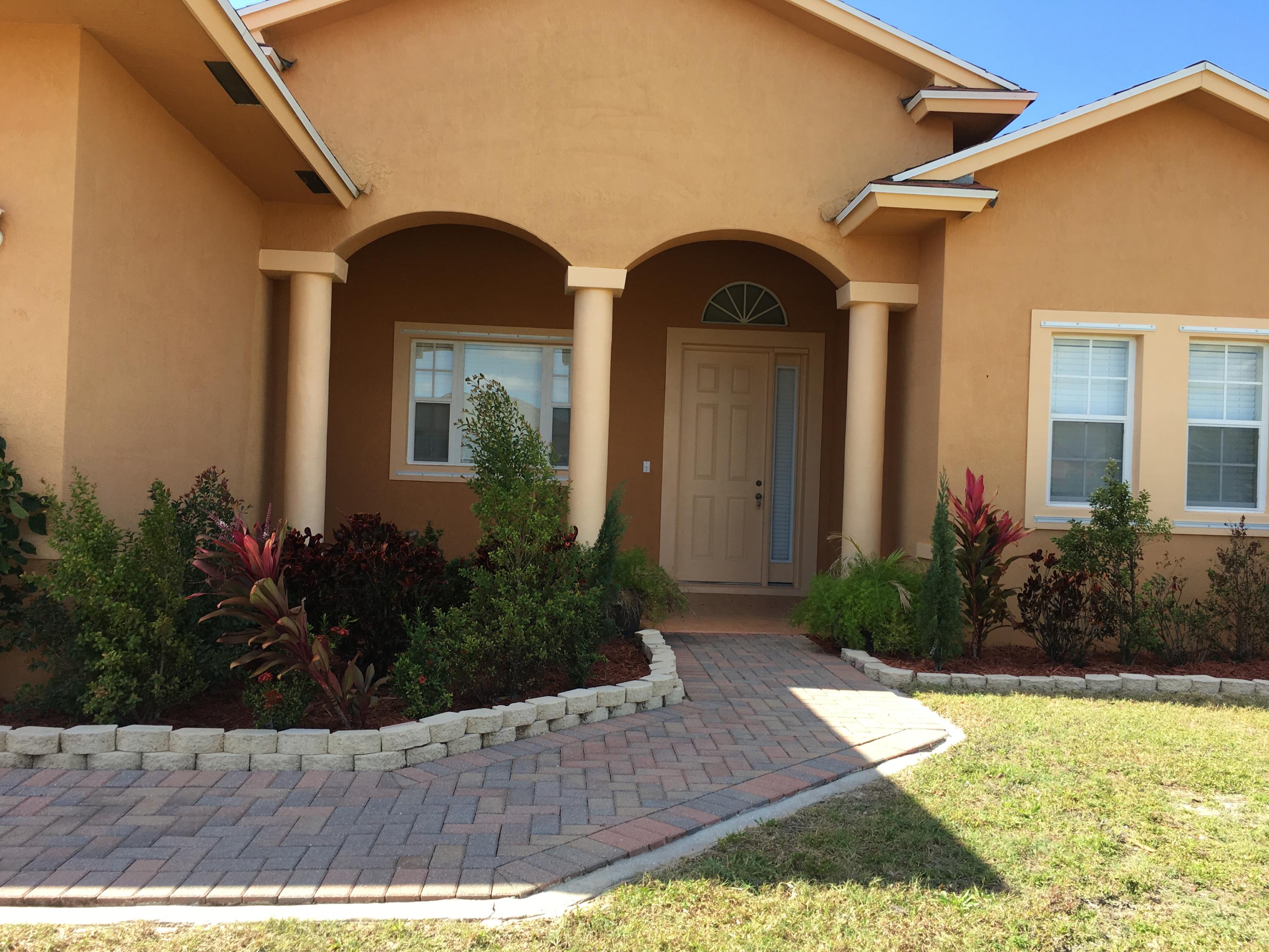 4220 Southwest Allsworth Street Port St. Lucie, FL 34953 - Photo 36 of 36 BRICK PAVER DRIVEWAY