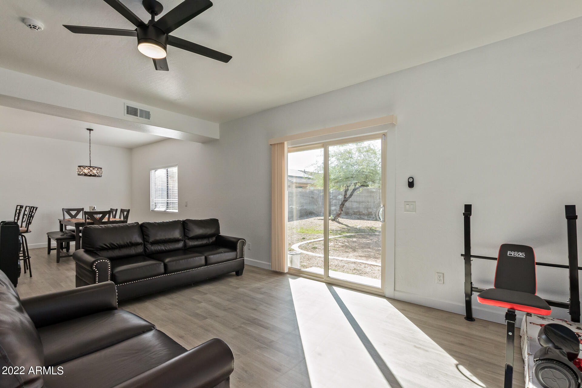 1315 West Fremont Rd. Phoenix, AZ 85041 - Photo 4 of 22 a living room with furniture