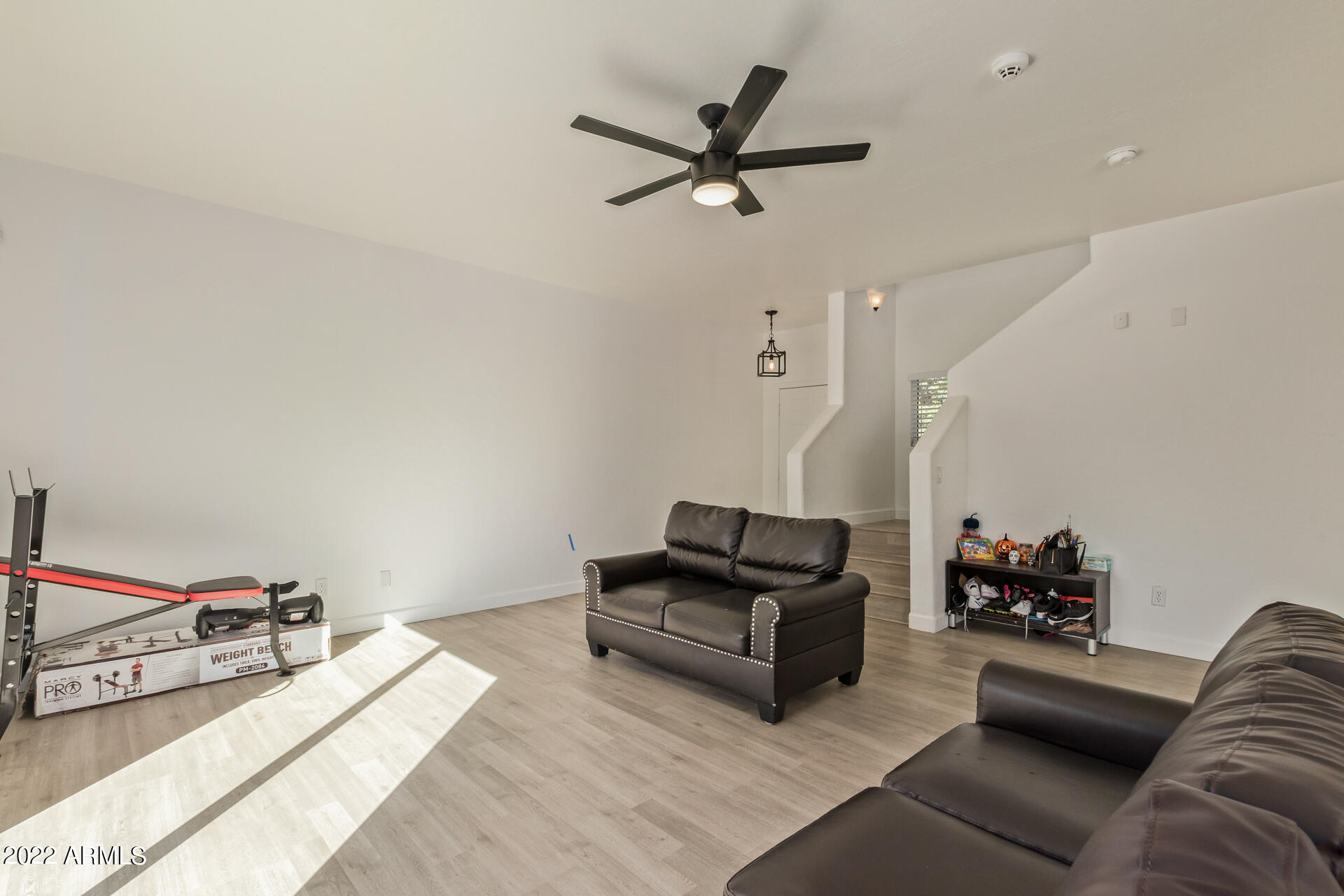 1315 West Fremont Rd. Phoenix, AZ 85041 - Photo 6 of 22 a living room with furniture