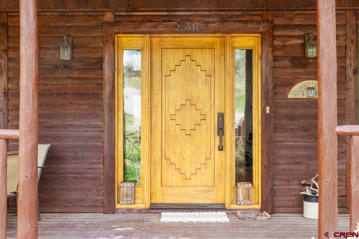 2490 County Road 17 Ridgway, CO 81432 - Photo 7 of 26 a view of a door front of a house