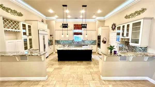 a living room with a stove and a table
