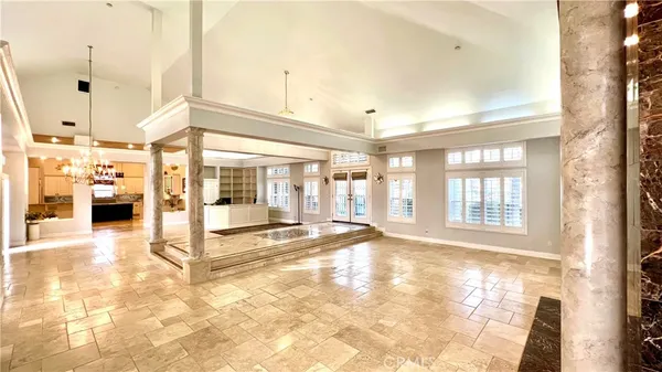 a view of a large room with windows