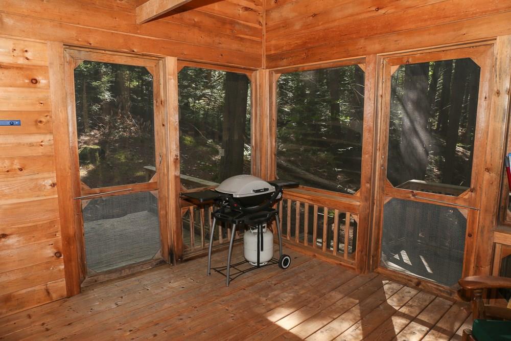 118 Crystal Spring Lane Rome, ME 04963 - Photo 17 of 20 Enjoy the evening on your sreened in...